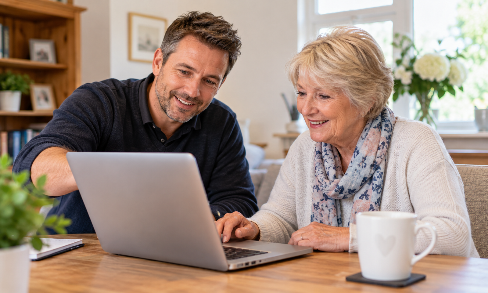 Friendly home computer support with a customer receiving help using a laptop